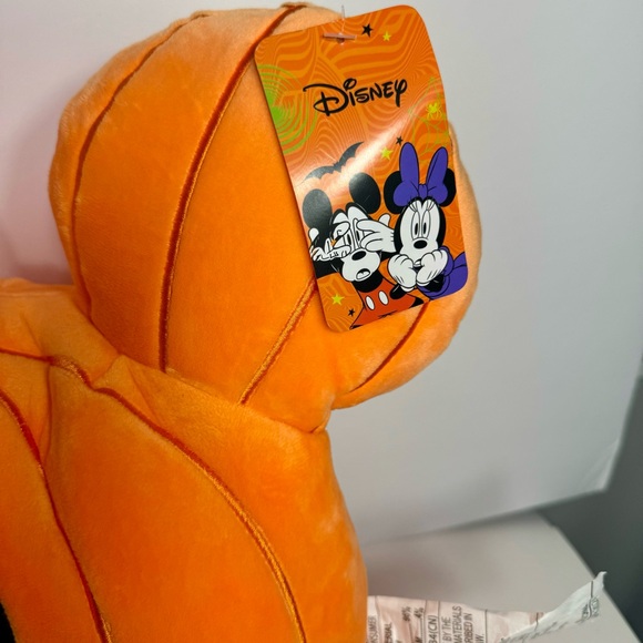 decorative throw pillow in the shape of a Mickey Mouse Pumpkin jack-o'-Lantern. - Picture 2 of 12